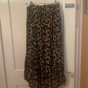 Black floral maxi skirt with stretchy waist and pockets